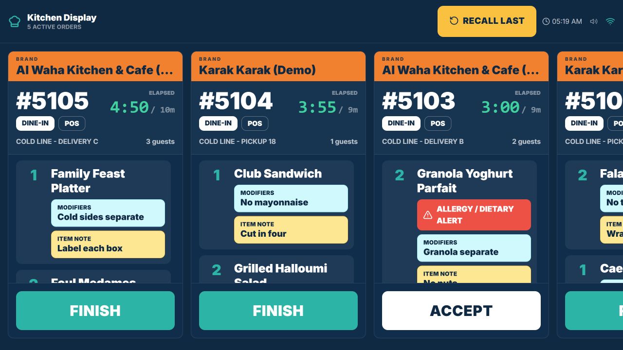 TajerGo Cold Line kitchen display showing five active delivery and pickup tickets across two demonstration brands with quantities, modifiers, preparation notes, elapsed and target times, and Accept or Finish actions